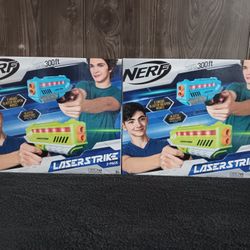 Two brand new light up Nerf laser strike guns
