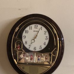 Seiko "Wave Symphony" Melodies in Motion wall clock, specifically model RE551B. 