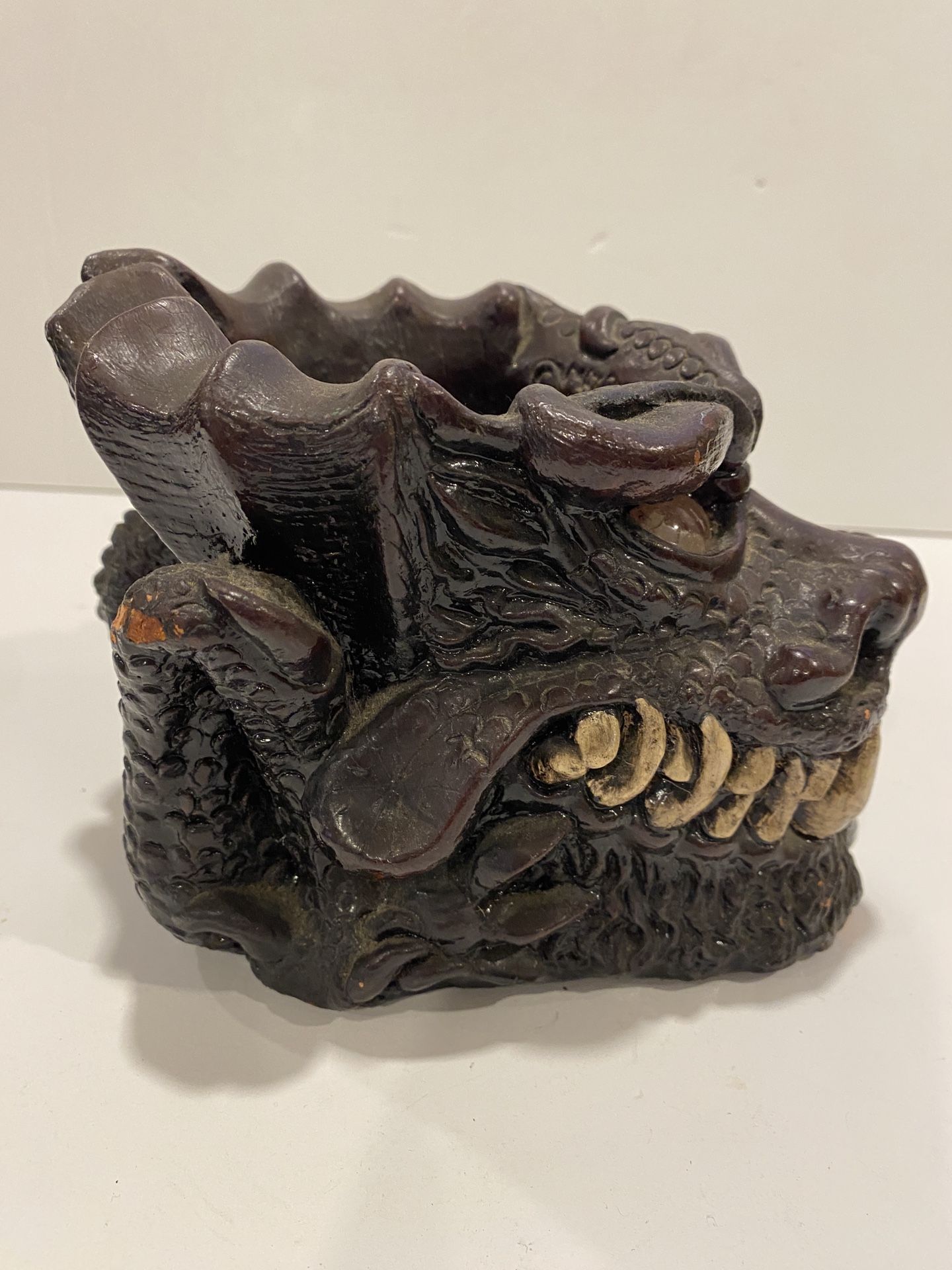 Vintage Matchless Candle and Sculpture Company Brown Dragon Head Glass Eyes 1981 votive candle holder 6” long x 5” tall x 5” wide some chips on paint