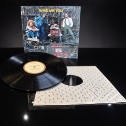 Original 1978 pressing of Who Are You by The Who on MCA Records.   Includes original MCA-branded inner sleeve. Iconic late-era release featuring the t