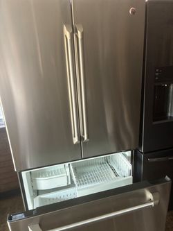 Stainless steel refrigerator by GE model # CFCP1NIZC SS