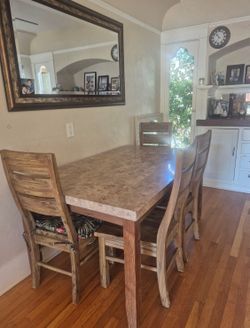 Nice marble table with 4 wooden chairs