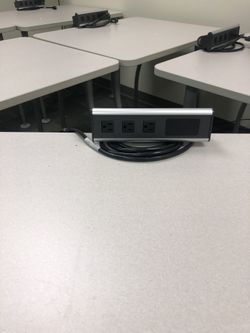 Work desk with surge protector