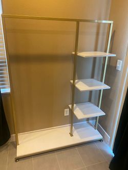 CLOTHES RACK PLUS STORAGE SHELF