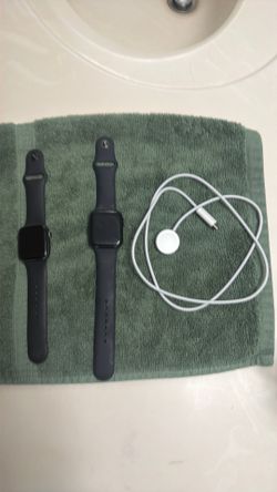 Apple Watches with charger