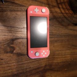 Pink Slightly Used Nintendo Switch With Super Smash Bros. Game 