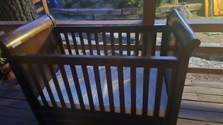 Solid wood sleigh bed crib
