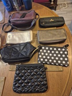 7 Women's purses and wallets most are new