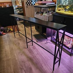 Narrow long entry table, behind couch table