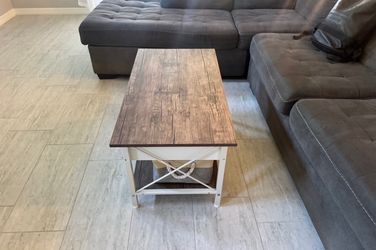 Coffee table with lift