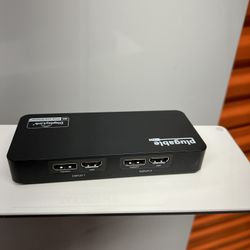 Plugable 4K displayport  dual monitor adapter.