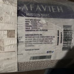 Brand new Unopened Ivory And Grey Area Rug