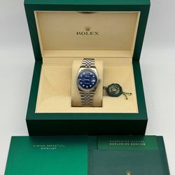 Rolex Datejust 1601 36mm stainless steel jubilee bracelet natural diamond blue dial white gold fluted bezel watch box appraisal