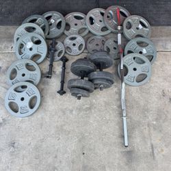 Standard weights 330lbs total plus curl bar and adjustable dumbbells