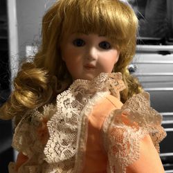 16” porcelain Doll  In Peach Dress