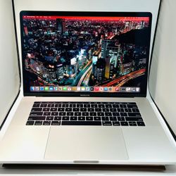 Apple MacBook Pro 15” 2019 Silver TouchBar 2.4Ghz 8-Core i9 32GB 1TB Radeon Pro Vega 16 Graphics
