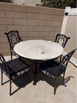 Table and chairs need gone