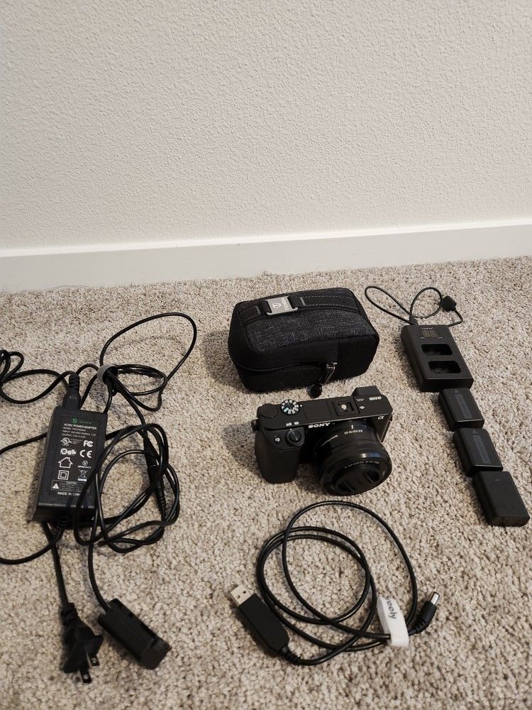 Sony A6100 W/ Kit Lens And Accessories