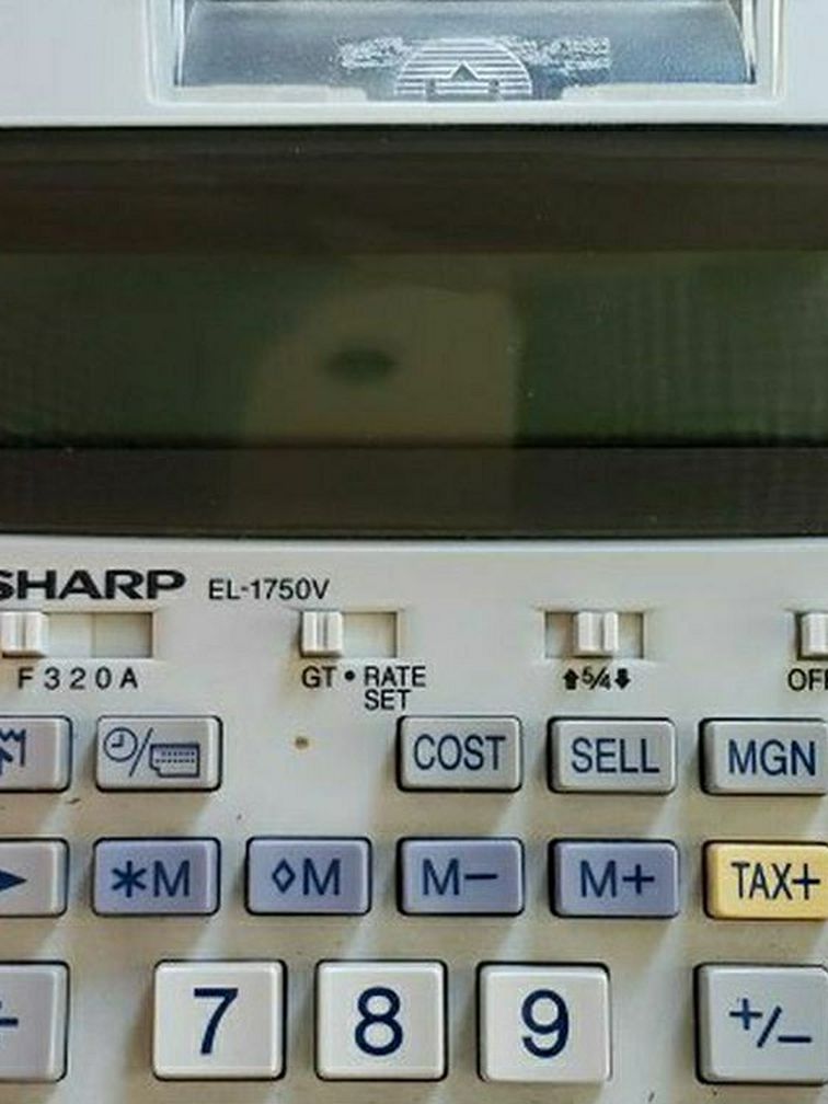 Sharp Calculator. Used One Time. AC/DC