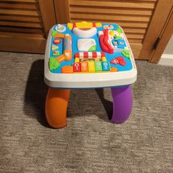 Fisher-Price Laugh & Learn Baby to Toddler Toy, Around the Town Learning Table with Music Lights