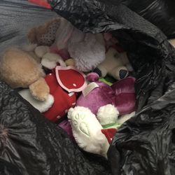 Huge Black Trash Bag Full Of Stuffed Animals 