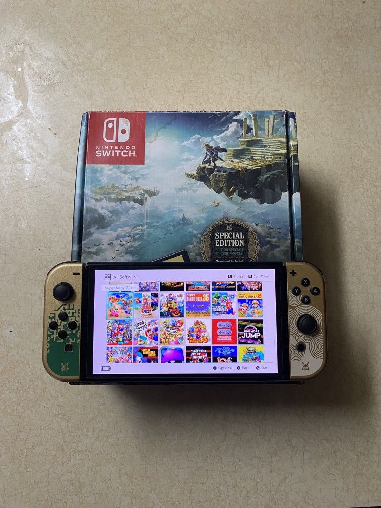 NINTENDO SWITCH OLED MOD with 512GB and 125 SWITCH GAMES and 7500 RETRO GAMES