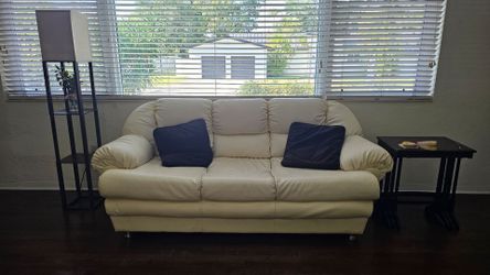 Cream faux leather sofa