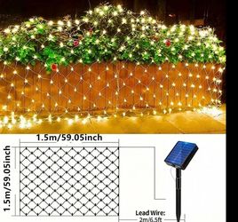 A Solar-Powered Outdoor Mesh Light, Measuring 59.06 Inches X 59.06 Inches, Equipped With An LED Mesh And Featuring 8 Different Modes, Perfect For Deco