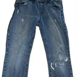 classic Levi's blue denim jeans featuring the iconic Two Horse Pull leather patch on the back waist