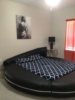 Modern Black Round Platform Bed – Contemporary Design
