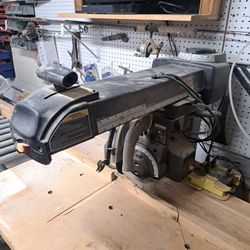 Radial Arm Saw With Supporting Roller Tables