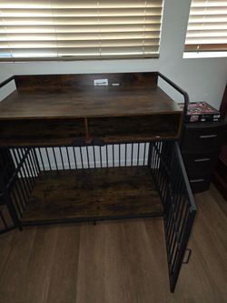 Wood and metal crate for dog.