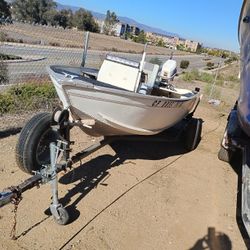 14 Foot Gruman Fishing Boat,25 HP Johnson 2 Cycle Motor 