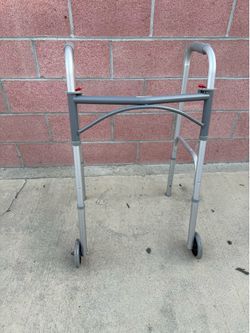 As new adjustable walker with front wheels only $15