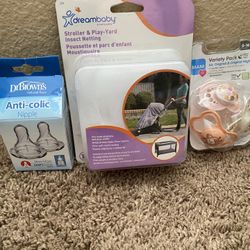 Baby Items Brand New- Pacifier 3 pack, Anti-Colic Nipples, and Stroller netting. 