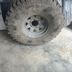 Uniroyal 33” Tire And Wheel 
