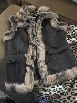 Faux leather and fur vest