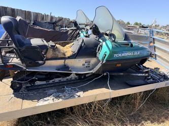 Snowmobiles And Trailer