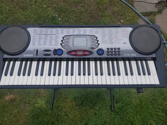 Casio Electronic Keyboard Piano And Stand 