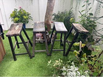 4 wooden stools.