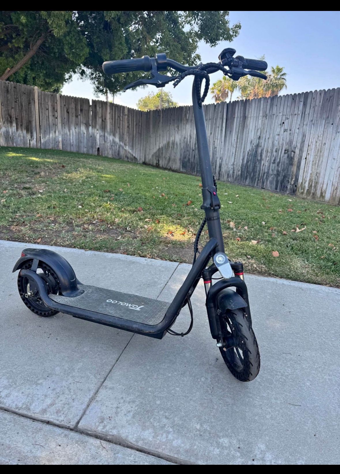 Used it in good working conditions TOMOLOO Electric Scooter for Adults 12" Plus Tires 50 Miles Long