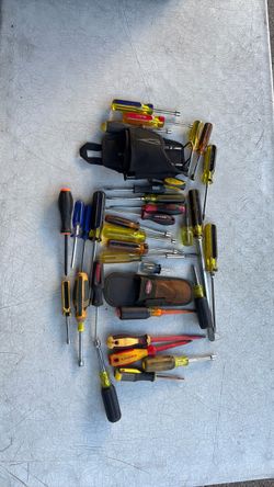 33 pi’s screwdrivers and tool pouches.