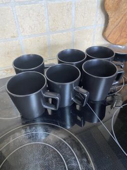 7 Black Mugs