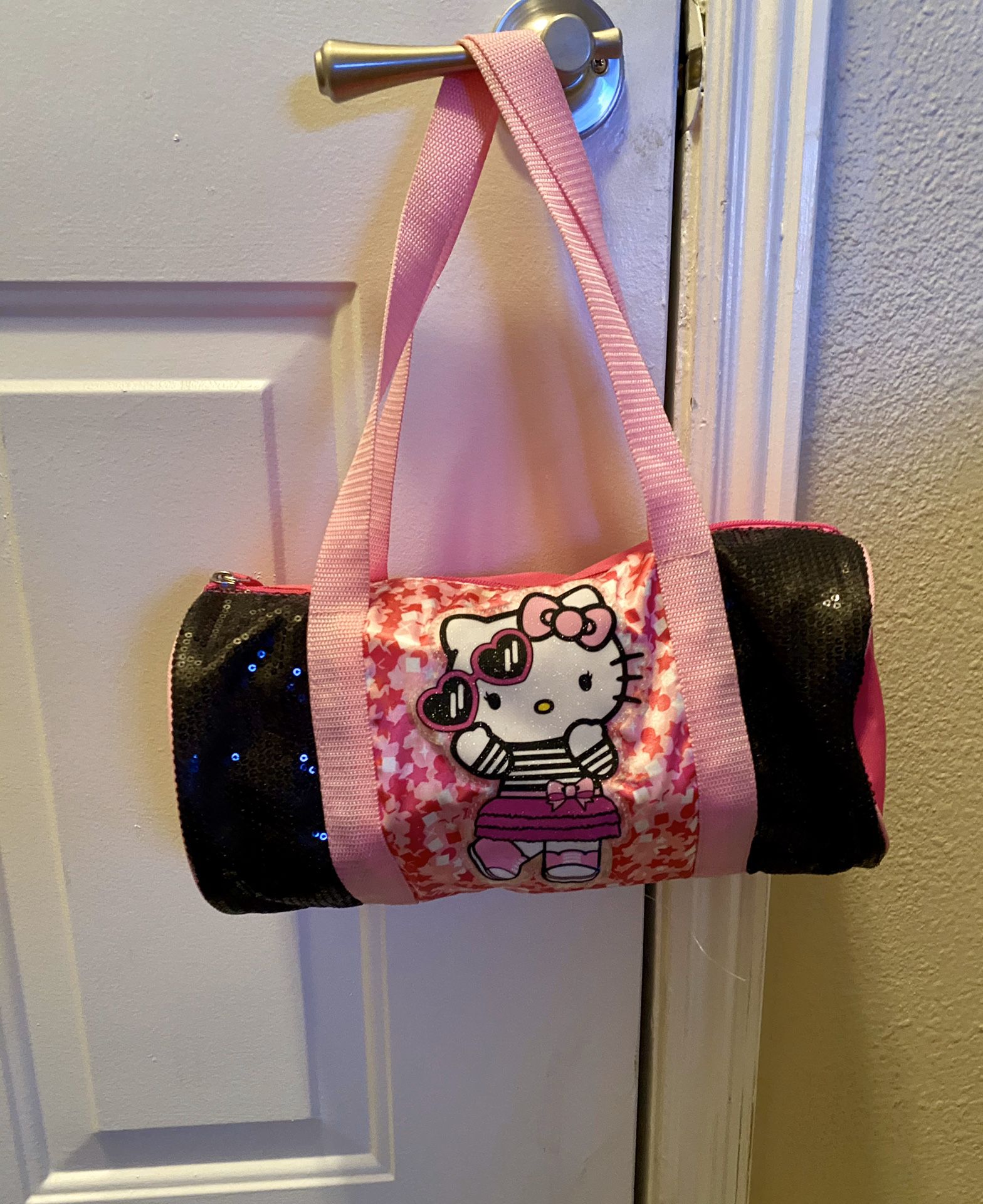 GIRLS PINK WITH SPARKLING BLACK SEQUENCE HELLO KITTY SMALL DUFFLE BAG