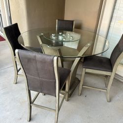 Unique Glass top table with 4 chairs and removable turntable