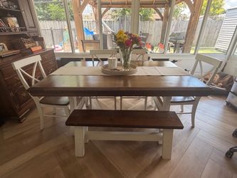 Dining room table with chairs and bench