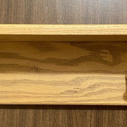 Small Oak Shelf W/2 Pegs. 24” W x 7.5 H x 5.5” D (shelf) 