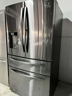 The Samsung is a popular 28 Cu. Ft., 4-Door French Door Refrigerator in Fingerprint Resistant Black Stainless Steel, known for its Food Showcase Door