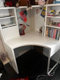 Selling a used corner workstation desk