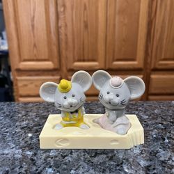 Vintage Plastic Mice On Cheese Base Pair of Salt and Pepper Shakers.  Preowned never used.  Has been on display in a cabinet with a very large salt an